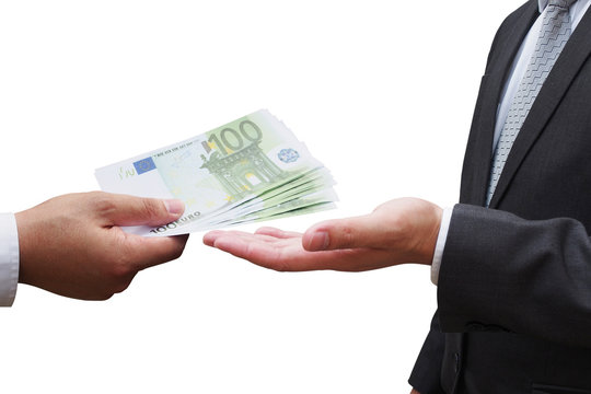 Businessman giving euro money to his business partner, Businessm
