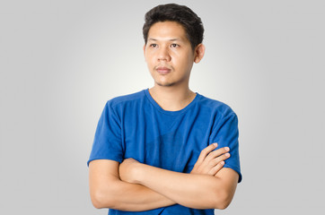 Portrait of Asian man (Thailand), isolated on gray background