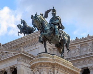 Fototapeta na wymiar Equestrian statue of Victor Emmanuel II of gilded bronze in the Piazza Venezia in Rome
