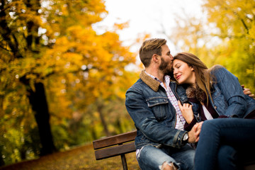 Young couple in the autumn park