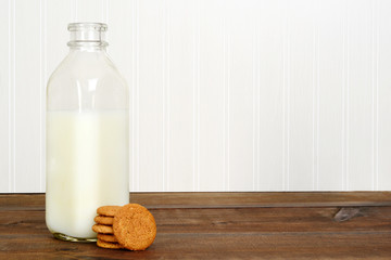 bottle of milk with cookies