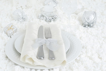 Fototapeta na wymiar christmas snow dinner table setting