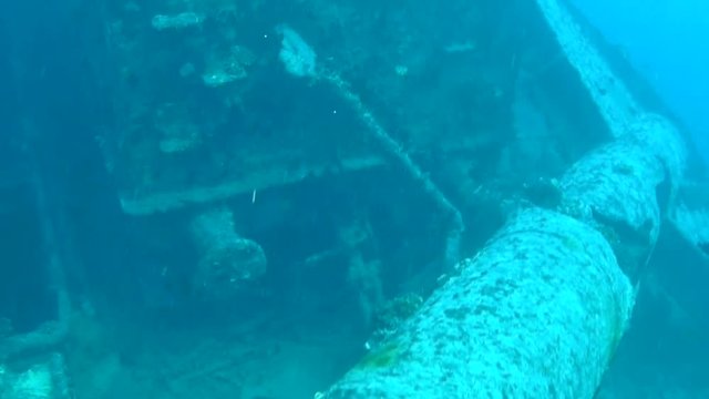 Passing a Mast and Tank Wagon on the top of the SS Thistlegorm Ship Wreck in the Red Sea