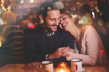 Romantic couple dating in pub - obrazy, fototapety, plakaty