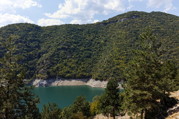 Fototapeta na wymiar Green Forest around Vacha dam, Rhodopes Mountain, Plovdiv Region, Bulgaria