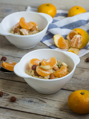 Oatmeal with tangerine and walnuts