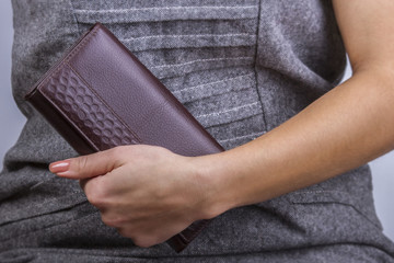 Woman with wallet in hand