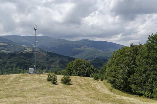 Telecommunication tower with antenna of advance summer, Plana mountain, Bulgaria