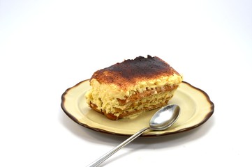 tiramisu share on a brown plate