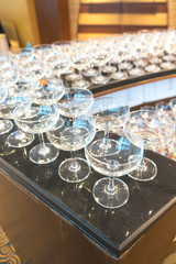 Stack of empty wine glasses