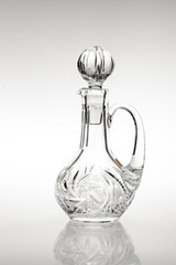 crystal carafe with closing on a light background
