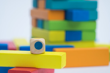 Colorful wood blocks stack game with color dice