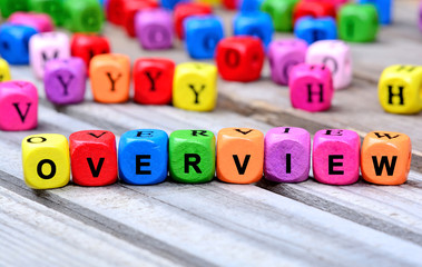 The colorful word Overview on table