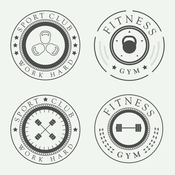 Set of Gym logos, labels and slogans in vintage style. Vector illustration. Fitness logo.