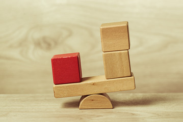 The concept of balance shown wooden toy blocks