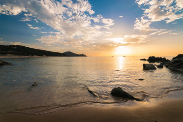 Fototapeta na wymiar Sunrise on the beach of Chia, Sardinia, Italy.