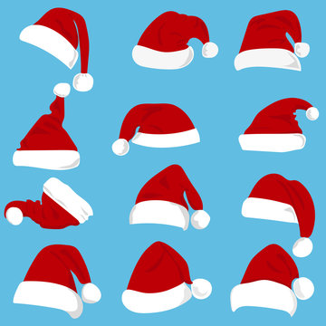 Set of red Santa Claus hats isolated on white background