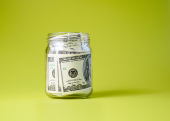 Bank of dollars on green backgrond. copy space