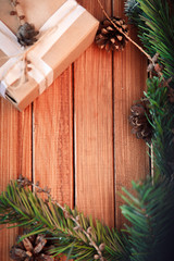 Fototapeta na wymiar Christmas background on wood. gift and marshmallows