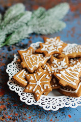 Christmas cookies in plate and fir branch