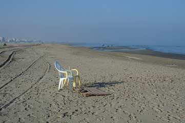 Fototapeta na wymiar Pollution of the seas. Plastic waste on the beach.