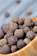 Allspice in a bowl on table
