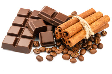 Dark chocolate bar, cubes, cinnamon sticks and coffee beans isolated on white background.