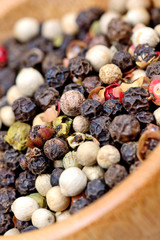 Colorful peppercorns in a bowl