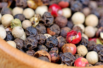 Bowl with colorful peppercorns