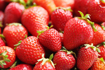 Fresh and tasty strawberries background, close up