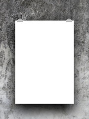 Single blank frame hanged by clips against gray weathered concrete wall background