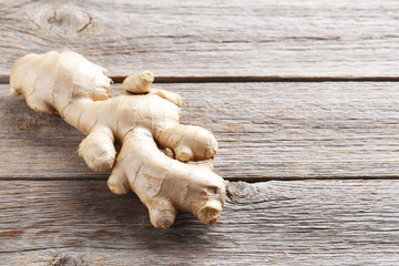 Ginger root on grey wooden table