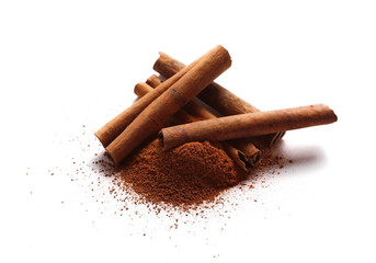 Cinnamon sticks and powder isolated on white background