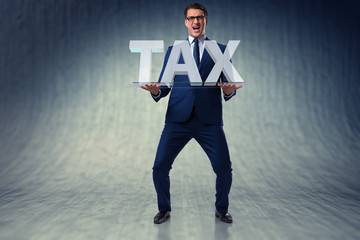 Businessman struggling with high taxes