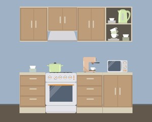 Kitchen in a blue color. There is a kitchen furniture of a beige color, a kettle, a microwave, a coffee machine and other objects in the picture. Vector flat illustration