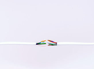 Cut off electrical wire isolated on white background.
