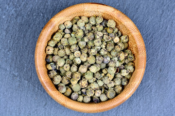 Bowl with green peppercorns