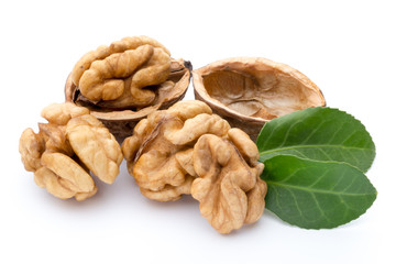 Walnut and walnut kernel isolated on the white background.