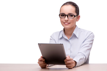 Businesswoman working on tablet computer on white background