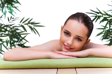 Young woman enjoying spa treatment