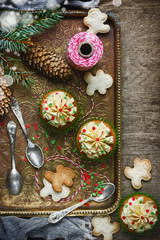 Christmas food background - festive cupcakes with butter cream