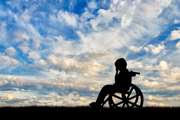 Disabled child crying in wheelchair