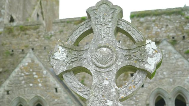 The High Cross in the Rock of Cashel stonehenge. In the grounds around the buildings an extensive graveyard includes a number of high crosses