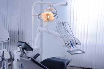 Modern dental practice. Dental chair and other accessories used
