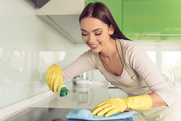 Woman cleaning her kitchen