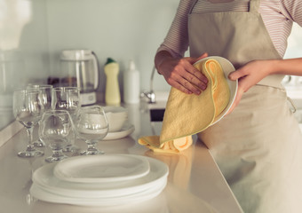 Woman cleaning her kitchen