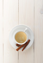 coffee Cup and saucer, cinnamon and star anise