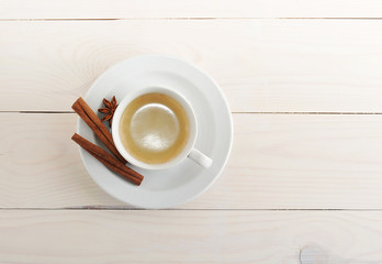 Fototapeta na wymiar coffee Cup and saucer, cinnamon and star anise