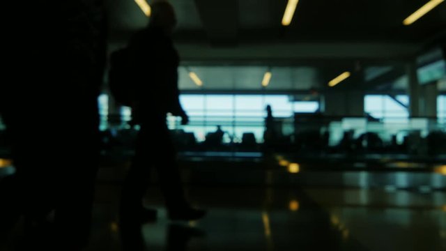 Life is a big airport terminal. People rushing to their flights, slightly blurred video