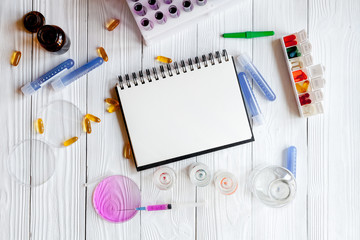 medical student working place at wooden table top view